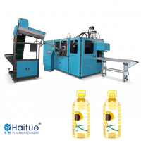 Machine professionnelle automatique de fabrication de bouteilles PET avec PLC, moteur de pompe haute productivité pour fût d'huile comestible de 20 L et grand bidon d'eau