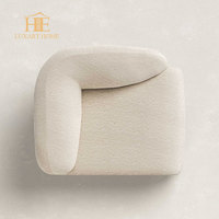 Fauteuil d'appoint de luxe moderne et unique pour hôtel, avec base en marbre naturel et revêtement en tissu, idéal pour salon, bureau à domicile ou espace détente.