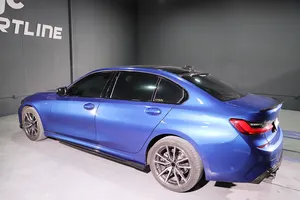BMWの新しい3シリーズセダンワゴン3203303402019-2020用の豪華なG28G20カーボンファイバーサイドスカートを変更