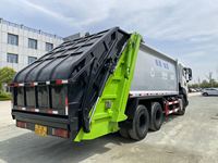 Camion benne compacteuse de déchets robuste de 20 mètres cubes avec double pompe, réservoir d'égouts et grande benne arrière à chargement par tombée