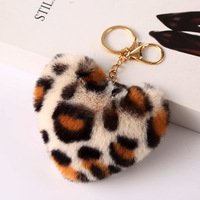 Usine Vente Directe Peluche Peluche Moelleux Forme Léopard Amour Pompon Imprimer Neige Fourrure Coeur Pom Pom Porte-clés 10 Pack