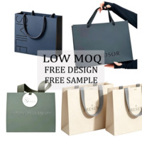 Sac en papier épais de luxe imprimé sur mesure avec poignée flexible et ruban, sac cadeau