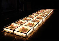 Plate-forme de scène en verre plexiglas transparent avec fleurs artificielles pour événement de mariage LED en gros lisse