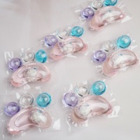 Vente en gros de dosettes de lessive en forme de patte écologiques 4 en 1 boules de détergent à lessive avec perles parfumées