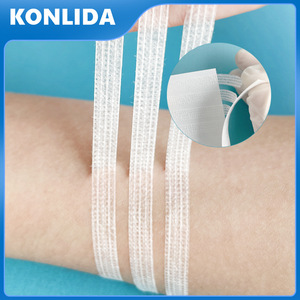 Non Woven Breathable Reinforcing Yarn Adhesive <b>Tape</b> Strips <b>White</b> Medical Surgical <b>Tape</b> For Dressing Fixation - Product Image 3