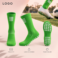 Chaussettes de football renforcées pour équipes de jeunes, vert vif, à profil fin, pour une adhérence sécurisée sur terrain, avec base de crampons et conception graduée pour la taille