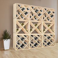 Meuble bar de luxe sur mesure style cave, avec casier à vin et support pour bouteilles, pour présentation murale de vins en restaurant