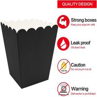 Boîte en papier kraft personnalisée noire pour pop-corn de poulet, avec bord festonné et ouverture supérieure, idéale pour les fêtes