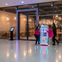 Machine de jeu d'arcade à pinces à prix, design néon, avec plateau tournant de 40 pouces pour l'affichage de cadeaux
