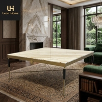 Table basse de luxe haut de gamme avec plateau carré en marbre et pieds en métal, design populaire pour salon