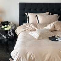 Ensemble de literie quatre pièces en coton longue fibre 100 fils, style luxe léger haut de gamme, jacquard satiné, housse de couette et drap
