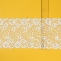 Vente en gros de tissu écologique à ourlet de jupe ondulée en dentelle de nylon à haute élasticité avec des techniques de tissage pour sacs