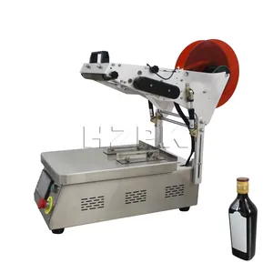 Hzpk Semi Automatische Zelfklevend Etiket Papier Kartonnen Doos Platte Fles Labeling Machine Voor Vierkante Fles Platte Sticker