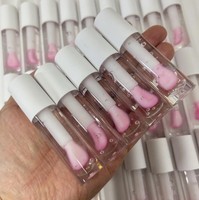 Huile à lèvres repulpante hydratante en profondeur, scintillante, au goût fruité, en pot blanc, cosmétique à marque privée