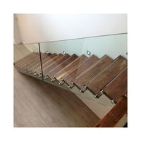 Escalier flottant traditionnel en acier inoxydable et verre trempé sans cadre, durable, solution personnalisée pour villa et appartement, usage intérieur