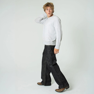 Jeans de mezclilla negros de corte y confección, de pierna ancha, tiro alto, con dobladillo deshilachado rojo, estilo vintage streetwear, holgados y con dobladillo. - Product Image 1