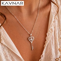 Collier en laiton plaqué or blanc avec pendentif cœur et clé, orné de zircons cubiques dansants, hypoallergénique, cadeau de Saint-Valentin ou d'anniversaire pour elle, vente en gros