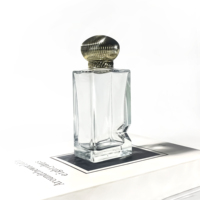 Bouteilles de parfum uniques bocaux en verre avec couvercles bouteille d'huile d'olive vide clair parfum atomiseur bouteille de parfum en verre 100ml