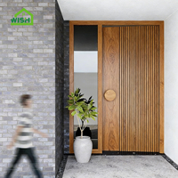 Porte d'entrée pivotante de luxe en bois massif insonorisée pour villa, design fini