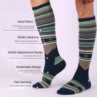 Chaussettes de ski en laine mérinos pour hommes et femmes, épaisses, avec semelle en tissu éponge, au-dessus du genou, pour le snowboard, chaudes, pour la randonnée en plein air