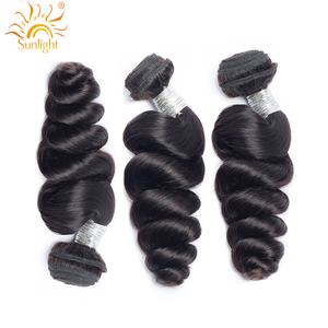 La luz del sol de cabello humano brasileño de la onda suelta paquetes de pelo con cierre 100% cabello humano rizado paquetes no Remy 4*4 Cierre de encaje - Product Image 2