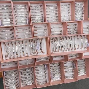 2024 en iyi fiyat afrika tarzı ucuz altın ve gümüş kaplama mix tasarımlar kadınlar için çinko alaşım rhinestone bilezik - Product Image 3