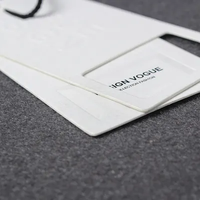 2025 OEM fabricant logo personnalisé suspendu étiquette nominative vêtements Jeans sac étiquettes volantes impression pour vêtements