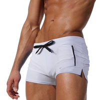 Nouveau maillot de bain sexy pour homme, short de plage à séchage rapide, maillot de bain uni décontracté, short taille haute ajusté, respirant, pour le sport et le surf