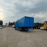 Truk Box HOWO 8x4 Off Road Tugas Berat Sinotruk 12 Roda Truk Van Kargo Tertutup Truk Transportasi Logistik Jarak Jauh