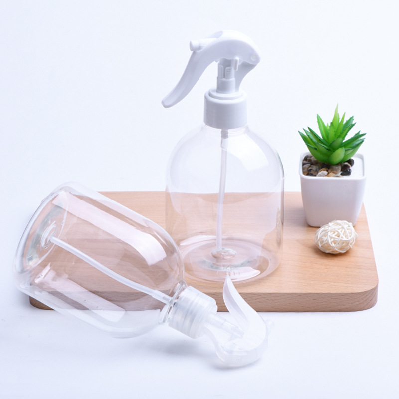 Botella transparente con pulverizador de gatillo blanco