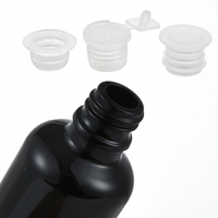 Vente en gros de petites bouteilles en verre noires de forme ronde, écologiques, avec couvercles, personnalisables avec un logo gravé, pour cosmétiques