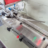 Machine d'emballage automatique de type coussin pour bâtonnets glacés, emballage en rouleau de film, étiquetage alimentaire et utilisation de feuille métallique