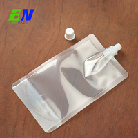 Pochette transparente à bec verseur avec bouchon à vis attaché pour l'emballage de liquides
