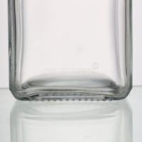 Vente de fabrication de bouteilles en verre d'huile d'olive carrées transparentes vides de 250 ml (8 oz) avec couvercles métalliques