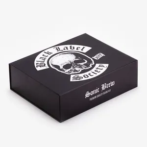 Kit de cuidado de cartón con forma de libro negro con cierre personalizado Caja de regalo de embalaje con inserto de espuma