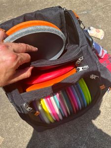 Free sample Disc Golf <b>Bag</b> with 24-26 Discs Capacity Disc Golf Backpack with Two Sidewall Supports and <b>Molle</b> Webbing for Beginner - Product Image 1