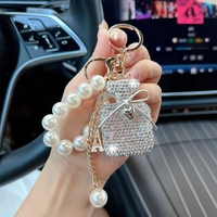 Porte-clés Bouteille de Parfum avec Nœud Papillon et Perles, Anneau de Sac à Main pour Femmes, Portefeuille, Anneau de Voiture, Breloques de Sac pour Filles