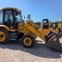 Chargeuse-pelleteuse d'occasion JCB 3CX originale du Royaume-Uni, populaire pour les travaux de terrassement et la réparation routière