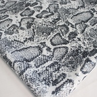 Tissu en maille polyester premium à imprimé serpent et sequins, motif peau de serpent scintillant pour tenue de mariage ou de fête