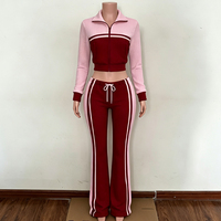 Ensemble de survêtement personnalisé en tricot gaufré pour femme, collection Automne-Hiver 2026, avec veste zippée à manches longues et pantalon évasé à jambes larges, ensemble de détente 2 pièces