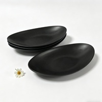 Assiette ovale de luxe en mélamine noire de 7 pouces, incassable, style japonais, en forme de bateau, pour salade, idéale pour les restaurants (vente en gros)