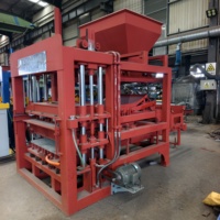 Machine de moulage de blocs entièrement automatique durable QT4-15, machine hydraulique de fabrication de briques en béton pour briqueterie moyenne