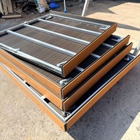Système de terrasse modulaire en WPC co-extrudé pour l'extérieur, assemblage direct usine, idéal pour les jardins, pelouses, villas, parcs et projets paysagers