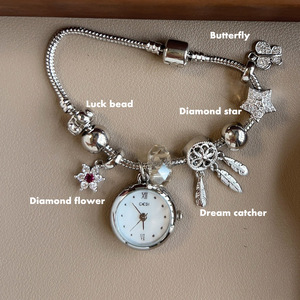 Montre à quartz de luxe pour femmes de haute qualité avec bracelet à breloques en cristal de fleur de diamant porte-bonheur de créateur de mode - Product Image 2