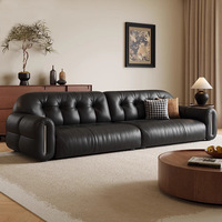 Foshan Style minimaliste italien haut de gamme noir rangée droite première couche cuir de vachette Art canapé meubles décoration de la maison Agent