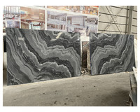 Fusion River – pierre de quartz, marbre ondulé, marbre gris, bois ancien, vague de marbre, mur d'allumettes