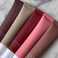 Tubes de baume à lèvres et gloss en silicone personnalisés à pointe inclinée, emballage en plastique PE avec impression offset pour crème solaire et rouge à lèvres