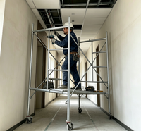 Échafaudage industriel robuste à cadre portique, section d'échelle galvanisée à croisillons en X, plateforme en acier pour entrepôt et usage extérieur