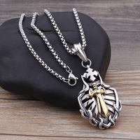 Pendentifs vintage en forme de croix et d'épée, contrastant or et argent