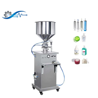 Machine de remplissage et de dosage verticale pour crèmes cosmétiques, sauces, confitures, miel, beurre, onguents, shampoings, liquides et eaux en flacons et seringues